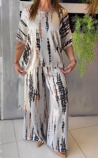 Emilia | Avslappnat tvådelat satinset med rund hals - Milafashion-se.com