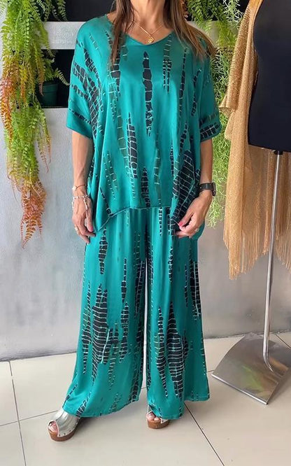Emilia | Avslappnat tvådelat satinset med rund hals - Milafashion-se.com